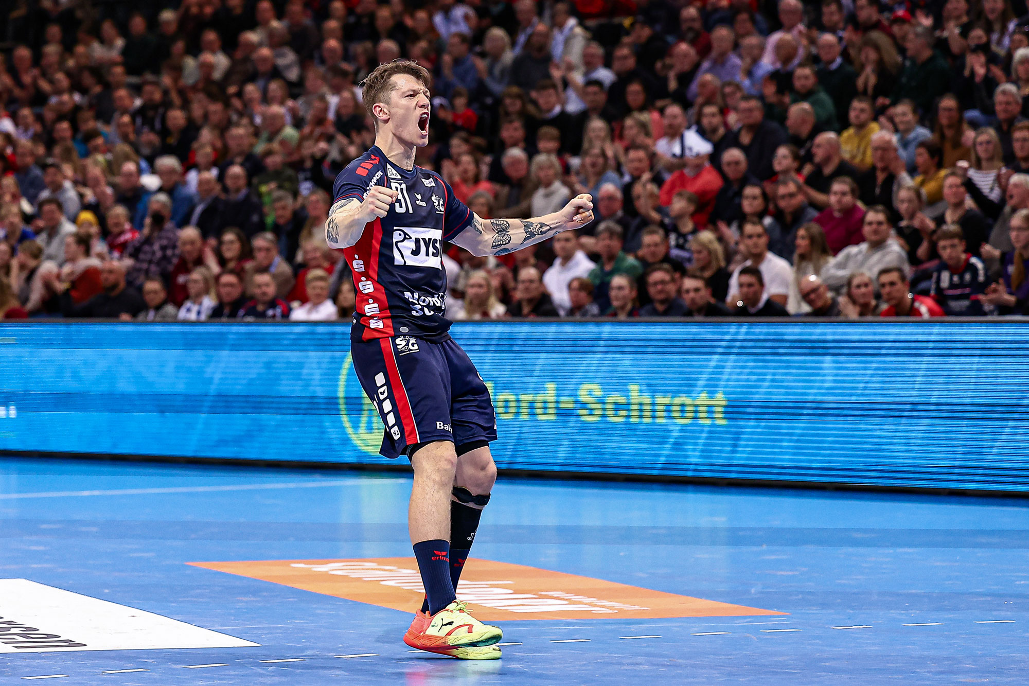 Flensburg seal first place with win over Ystads